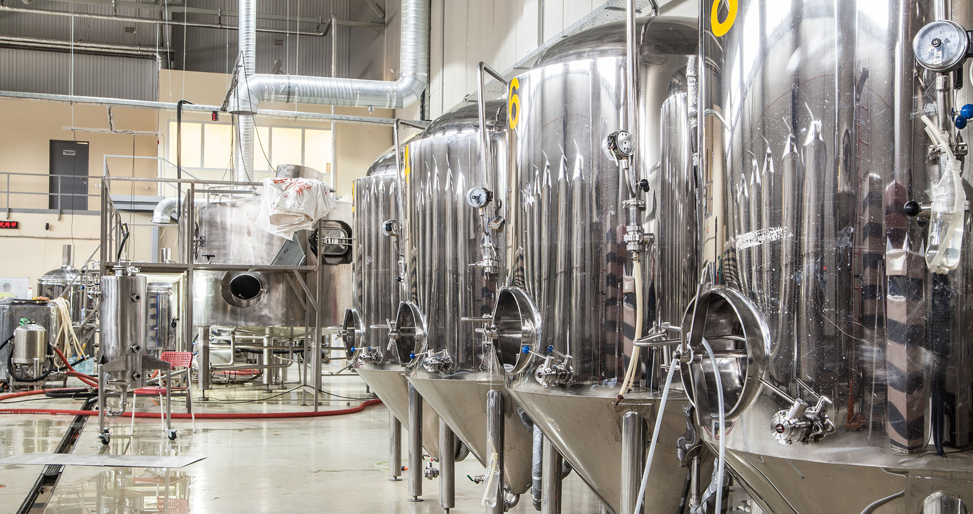 Modern brewery with stainless steel tanks